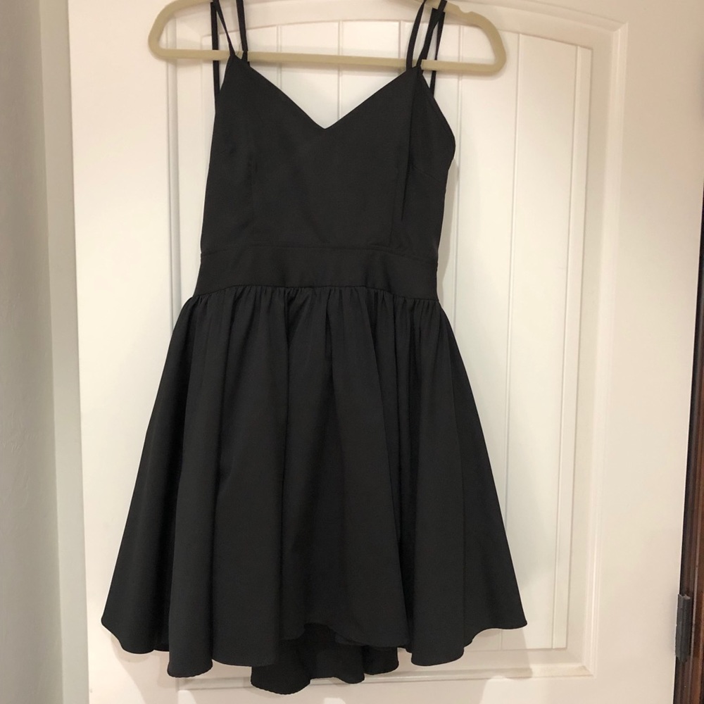 Black backless cocktail dress.